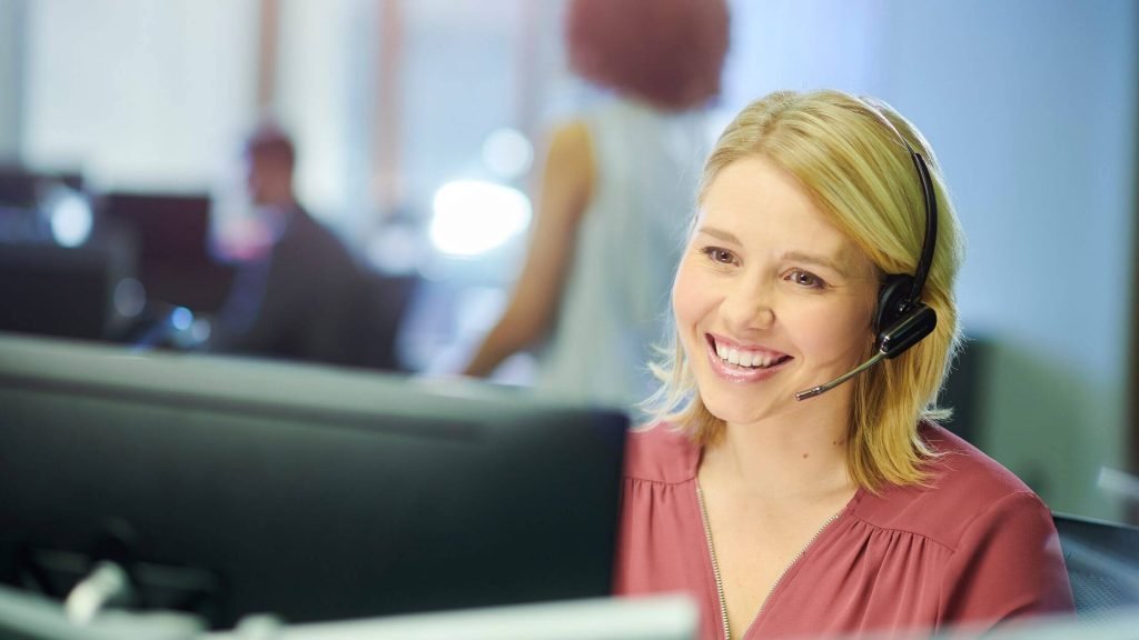 Call center agent taking property management maintenance calls at Absent Answer